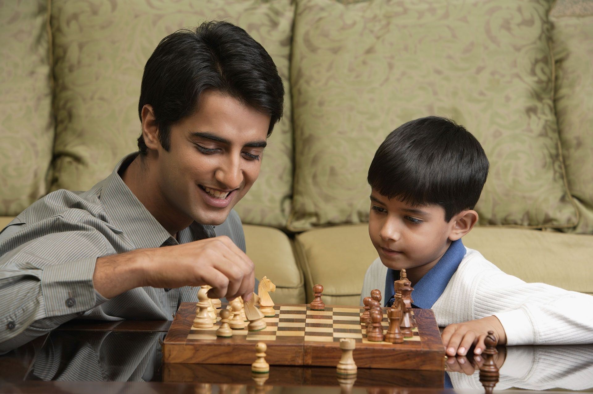 father-and-son-play-a-game-of-chess