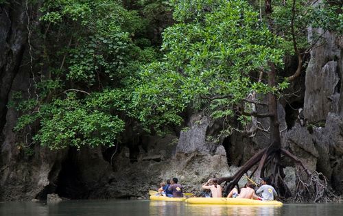 Kayakers inside a hong (hidden lagoon)
