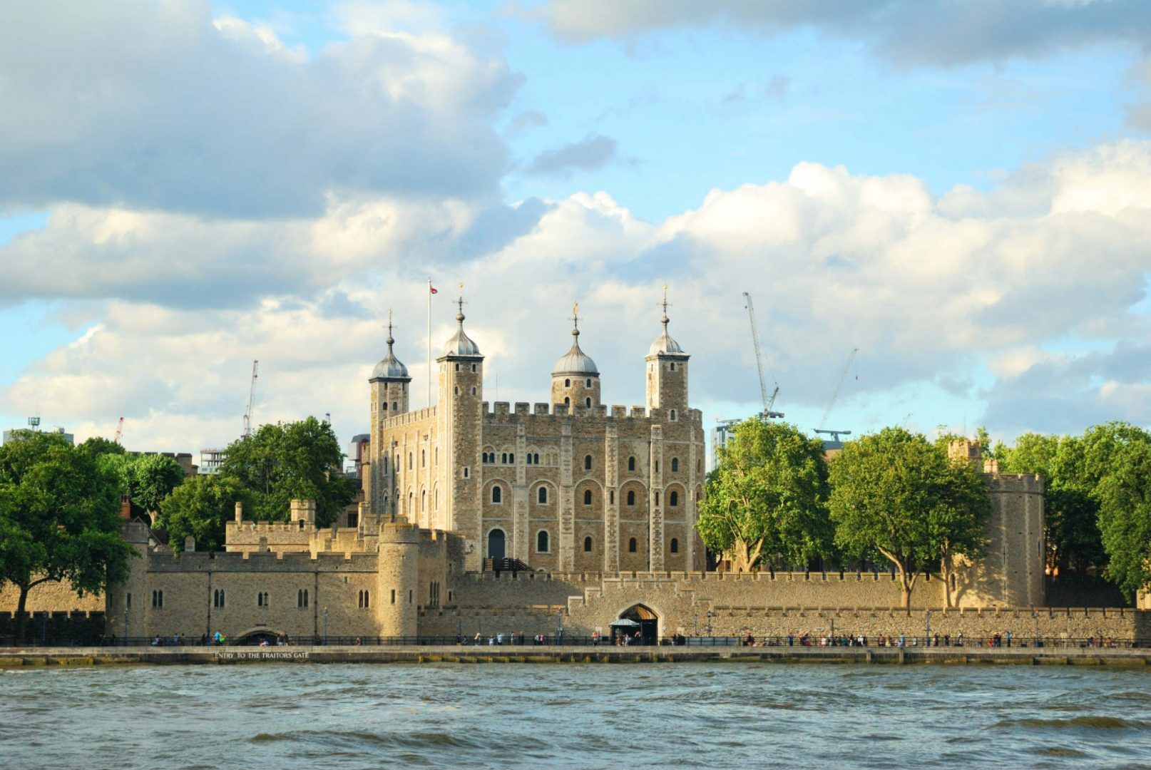 The Tower of London fortress in the evening light with white clouds © balounm/Shutterstock