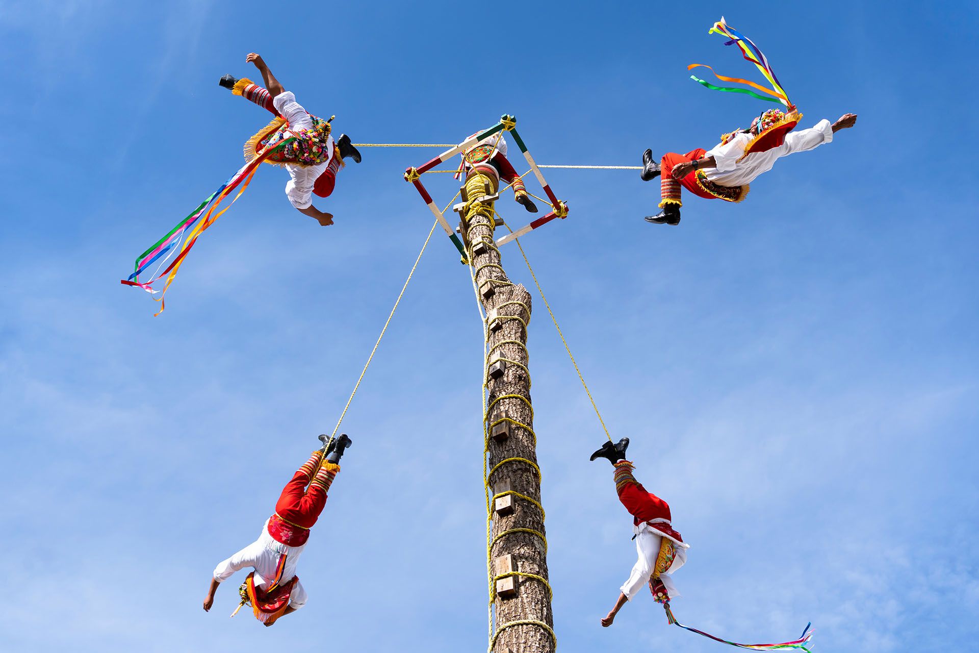 Papantla flyers perform their show in the magical town of Tequila Jalisco © Jose de Jesus Churion Del/Shutterstock