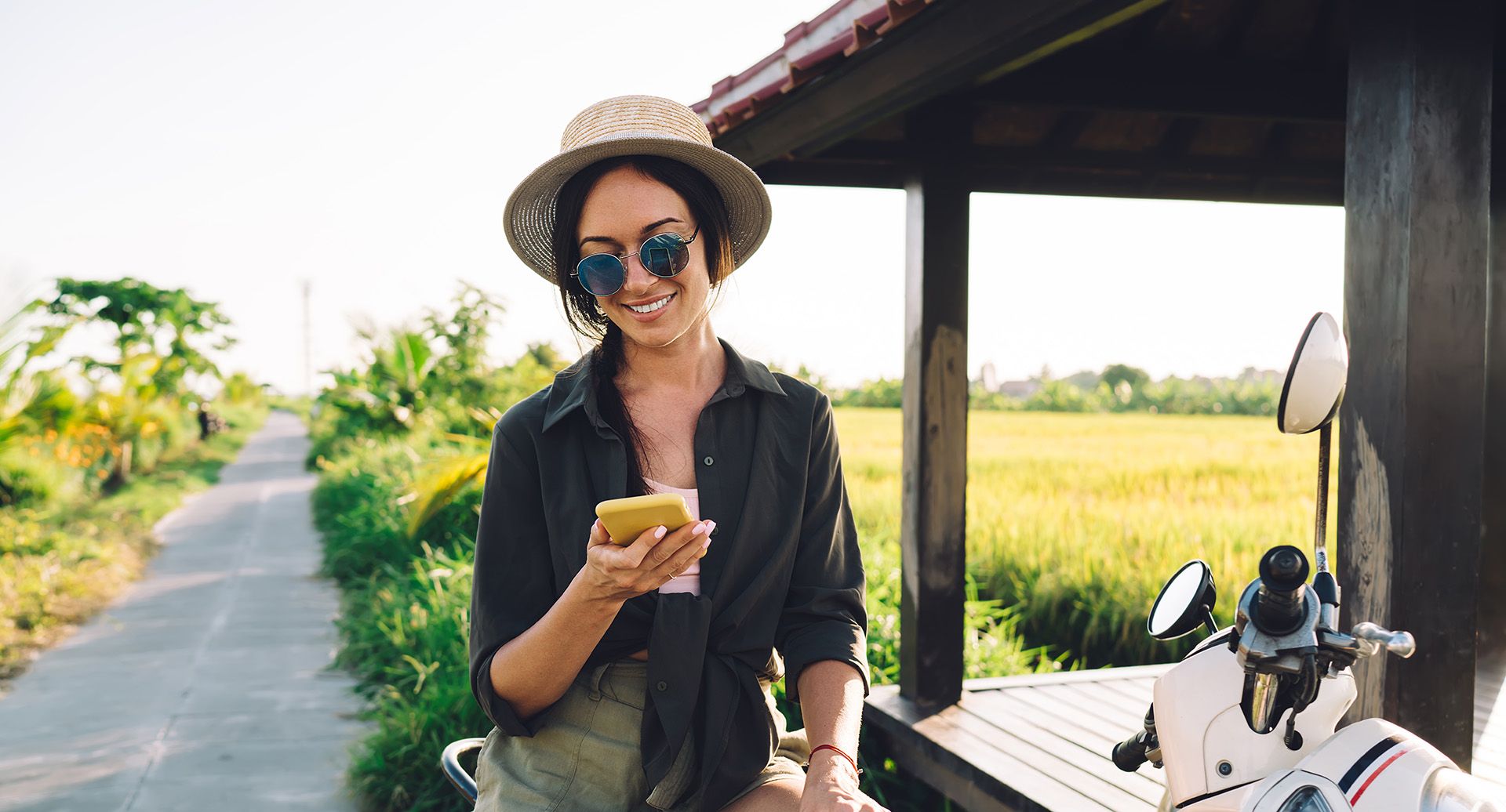 woman phone straw hat